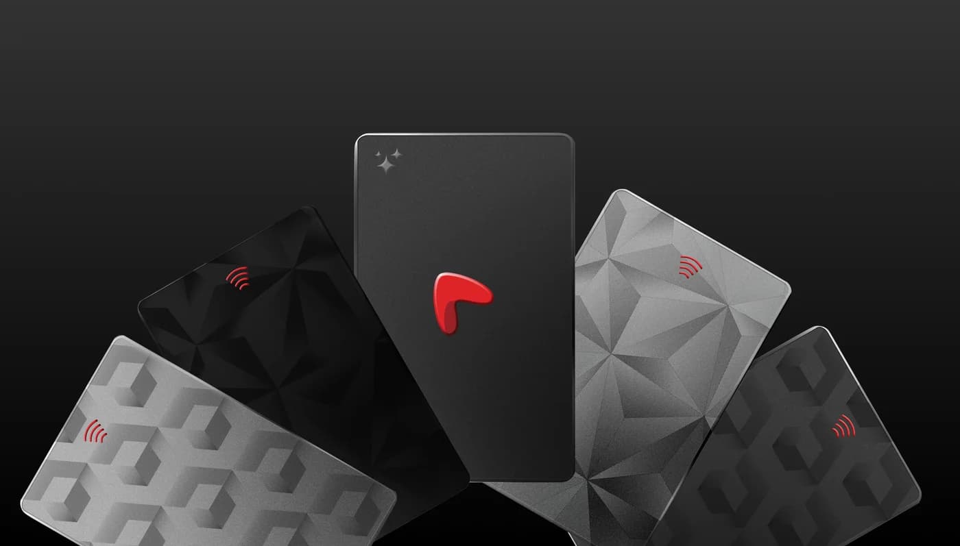 Starter NFC cards fanned in an arc: black and silver patterned fronts with the NFC mark, and the Linkist mark on the card in the middle